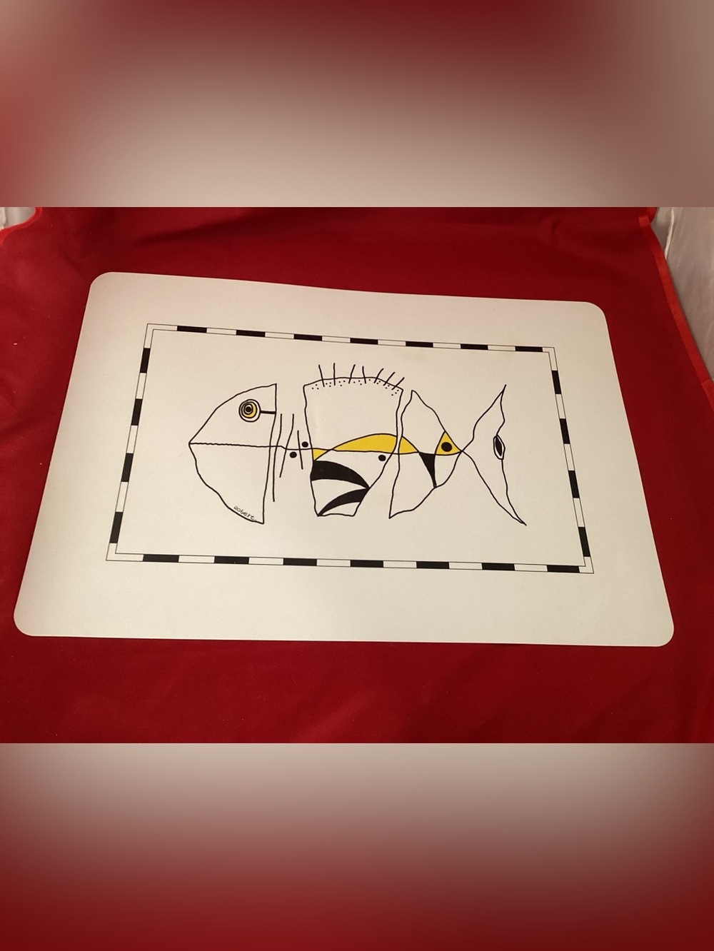3 White plastic Placemats with Yellow & Black Fish Illustration signed Robert
